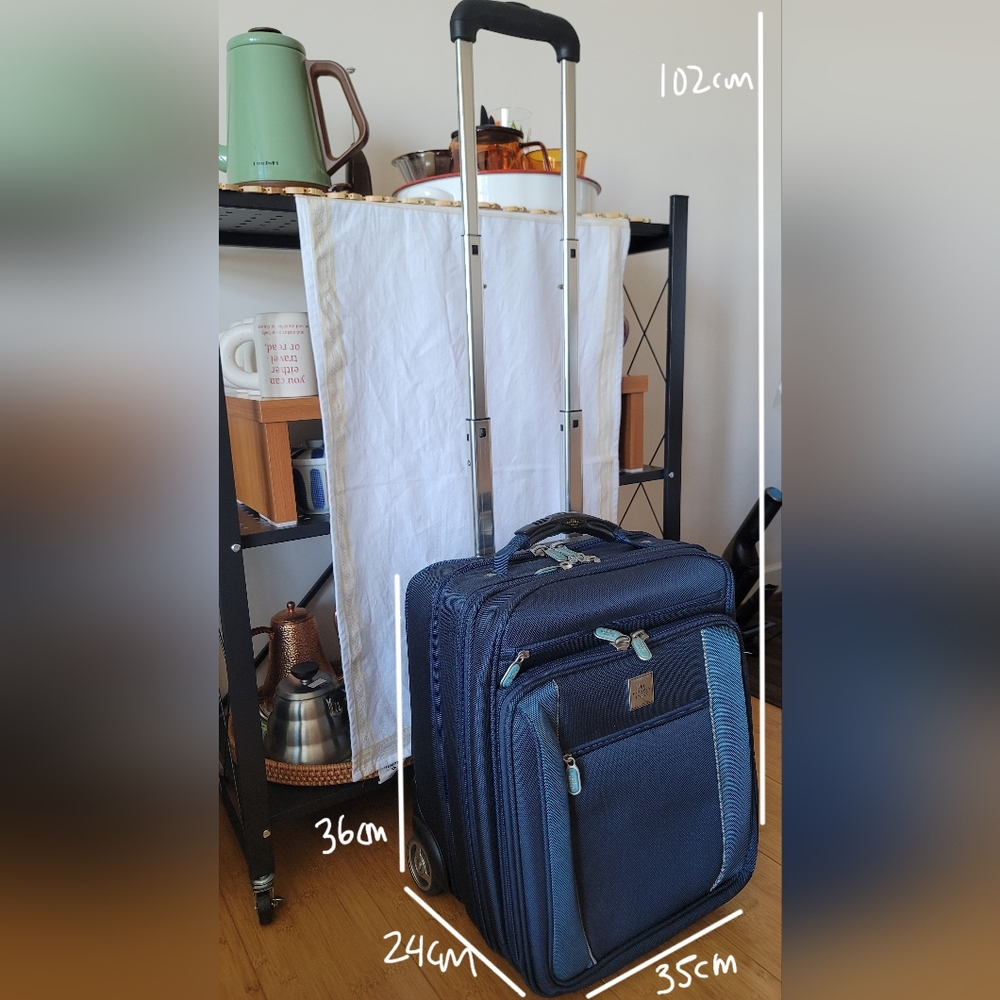 The Sharper Image - Blue Rolling Briefcase